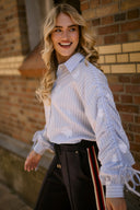 Rosa striped blouse in sky blue and kiss pink with a relaxed feminine fit